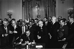 250px-Lyndon_Johnson_signing_Civil_Rights_Act,_2_July,_1964