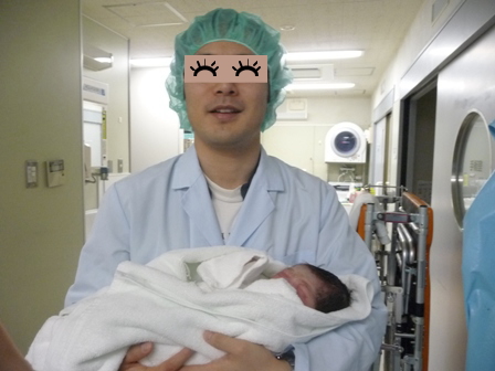 新生児と父親